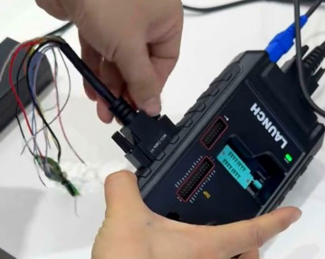 Connect the MCU V1 cable to the X-PROG5 programmer