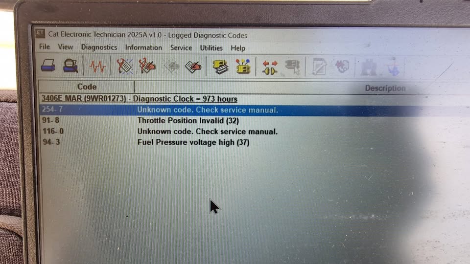 Caterpillar CAT ET diagnostic equipment for ECM calibration and engine programming.